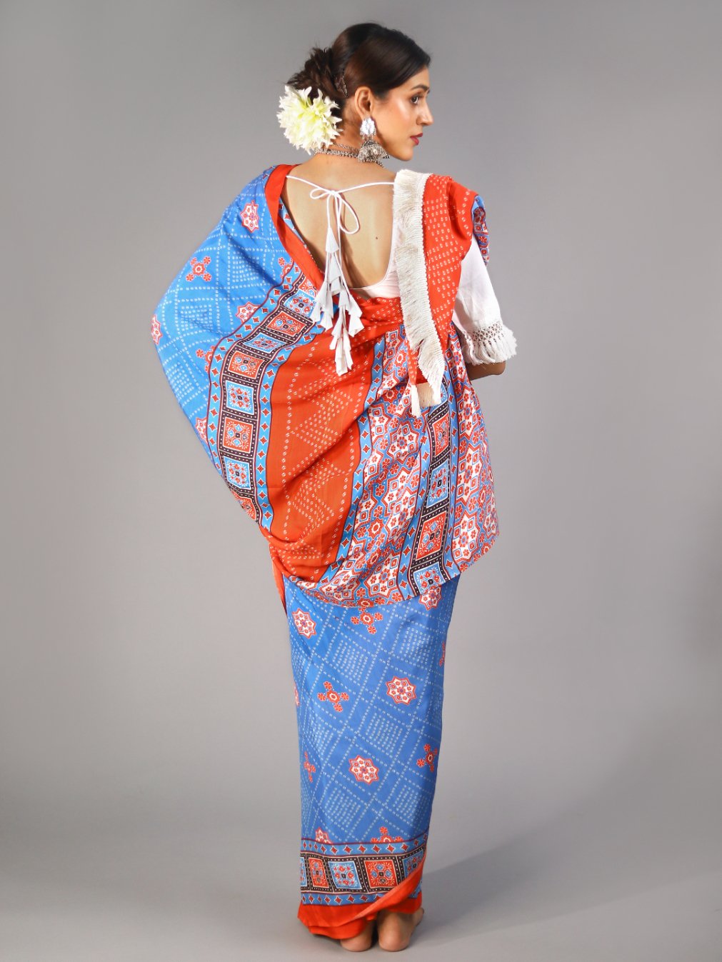 Buta Buti Blue Colour Ajrak Printed Pure Cotton Saree With Unstitched Blouse And Lace